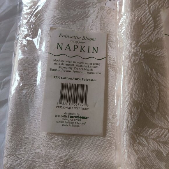 Dinner napkins in Ivory color Poinsetta Bloom design.4 per package.CottonPoly - Picture 4 of 4